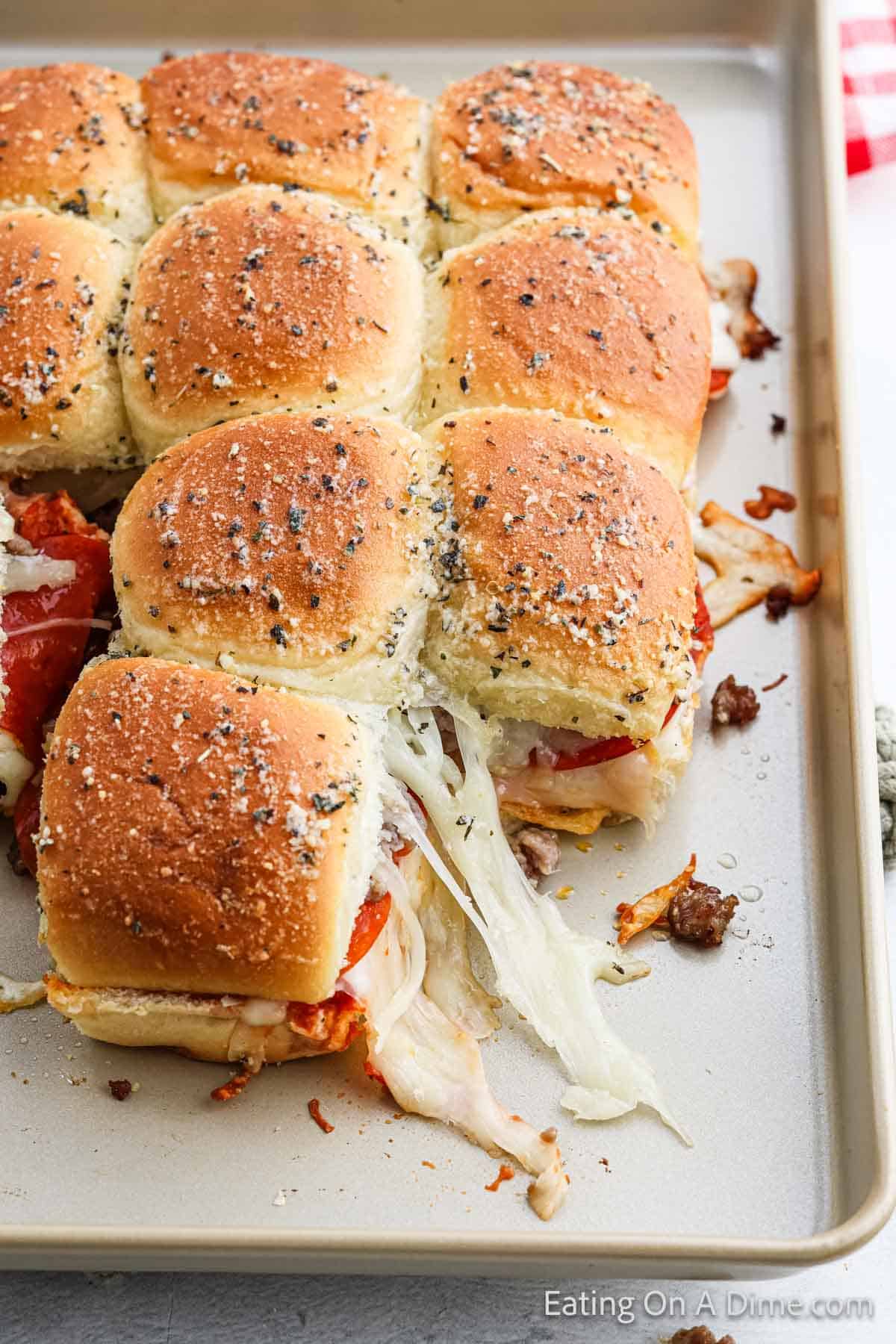 Hawaiin Rolls Pizza Sliders on a baking sheet