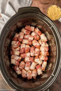 Crock Pot Bacon Wrapped Smokies - Eating On A Dime