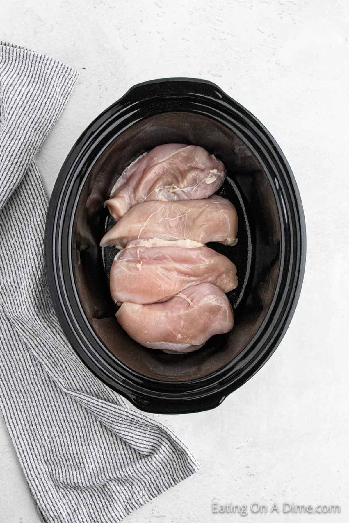 Chicken breast place in the crock pot