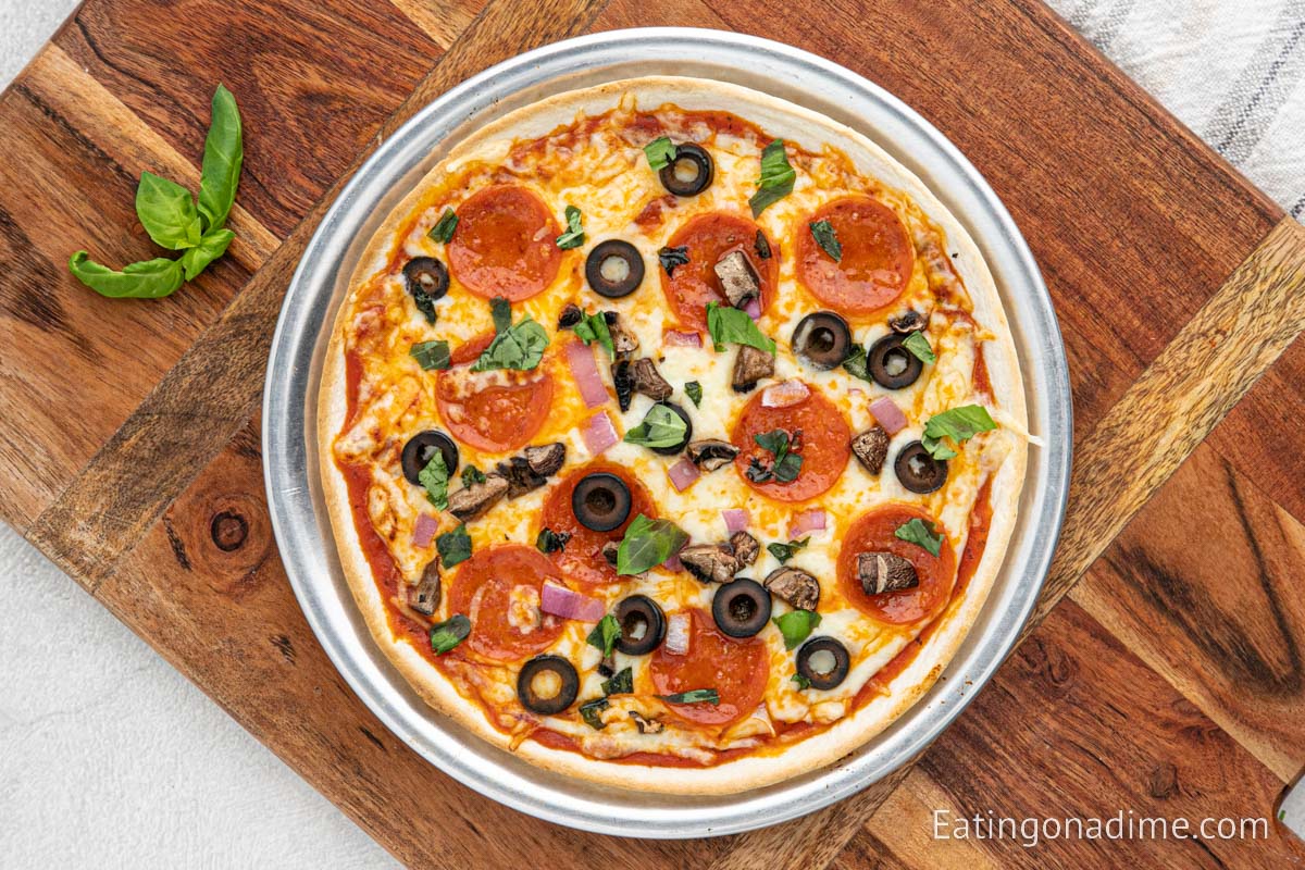 https://www.eatingonadime.com/wp-content/uploads/2023/02/Tortilla-Pizza-200-300-KB-7.jpg