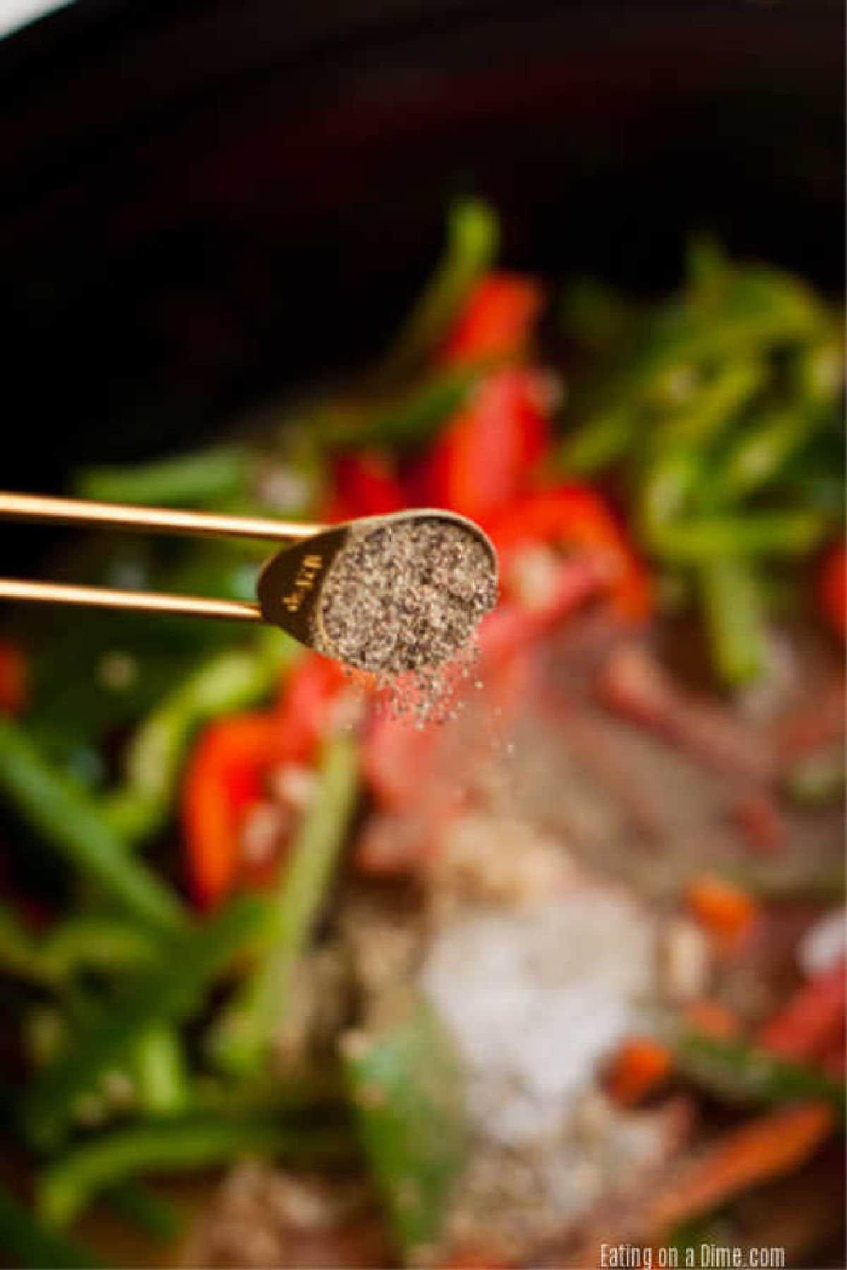 Adding seasoning to the slow cooker