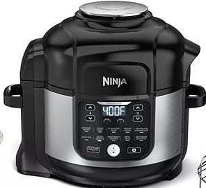 A black and silver Ninja Foodi air fryer, renowned among the best multicookers, boasts a digital display showing 400F. The control panel has several buttons for cooking functions and a slider for time and temperature adjustments. Sturdy handles are visible on the sides.