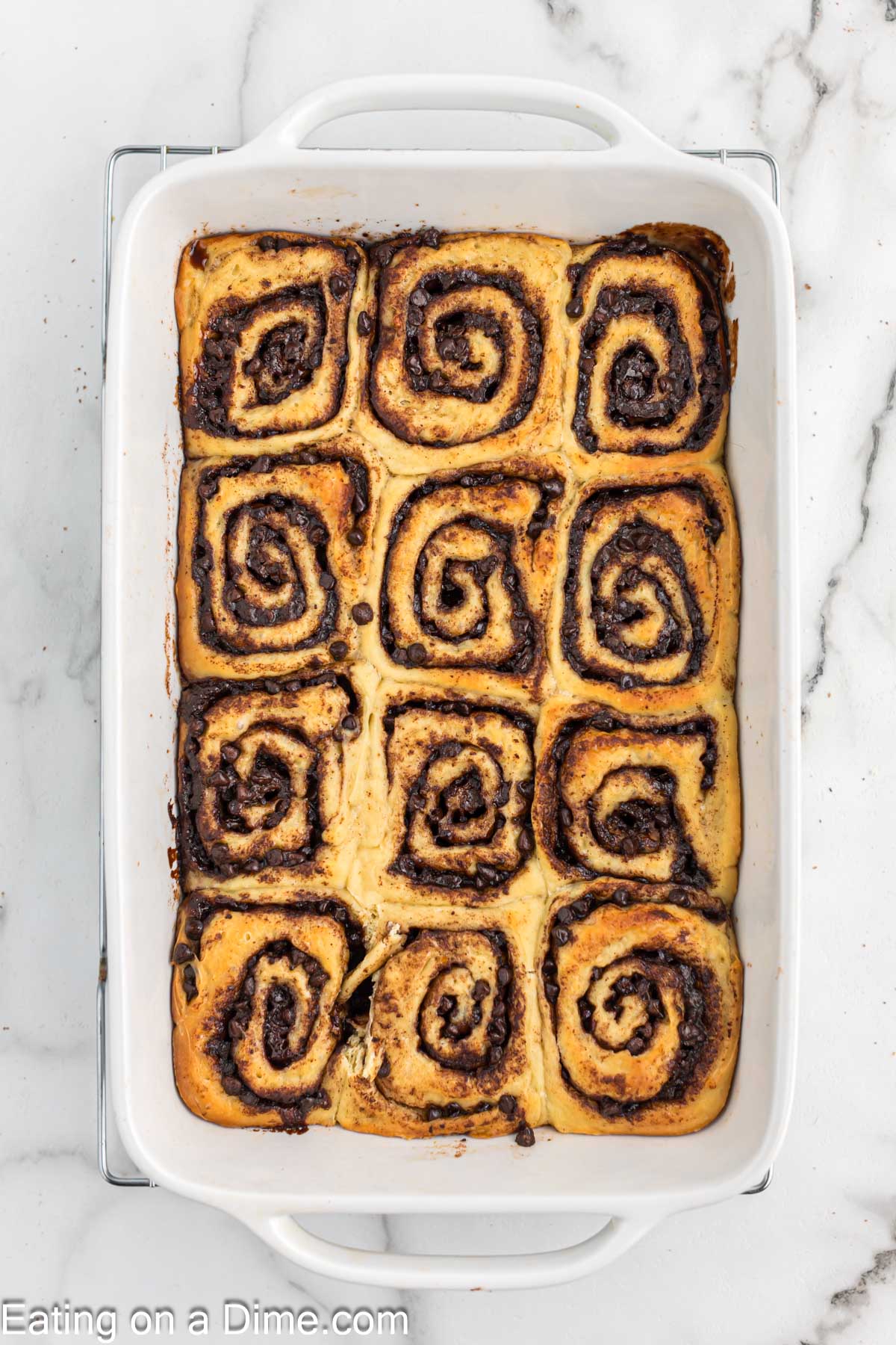 Baked cinnamon rolls in a baking dish