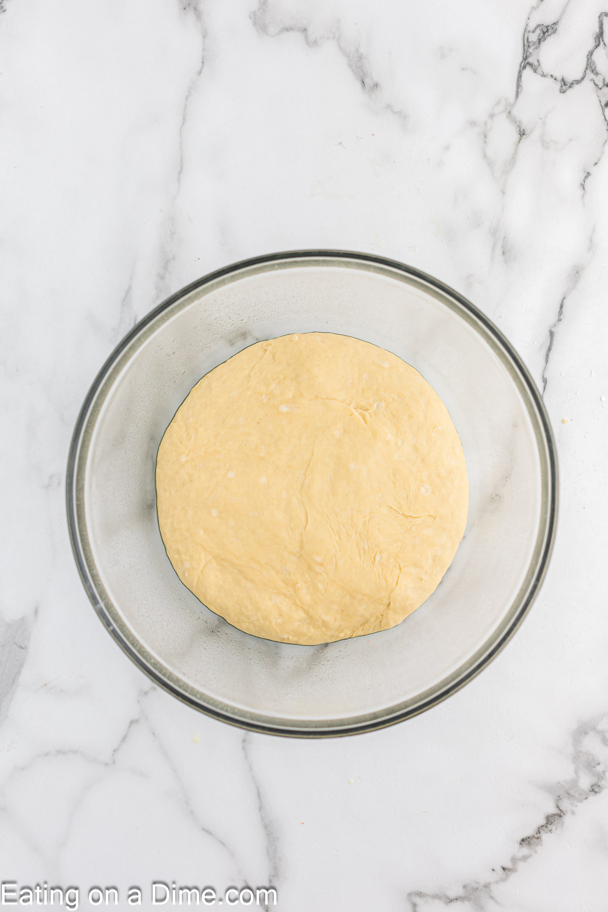 Large dough ball in a bowl