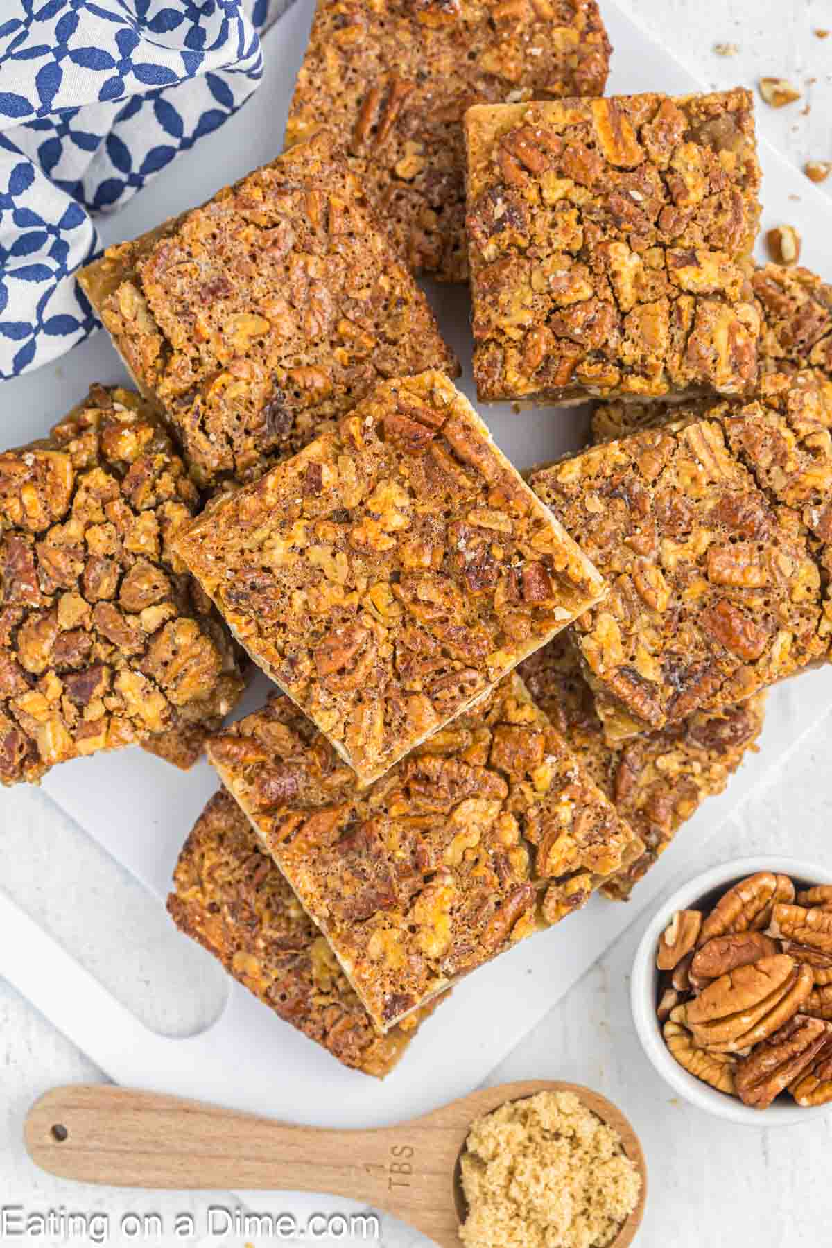 Pecan Pie Bars stacked on a platter