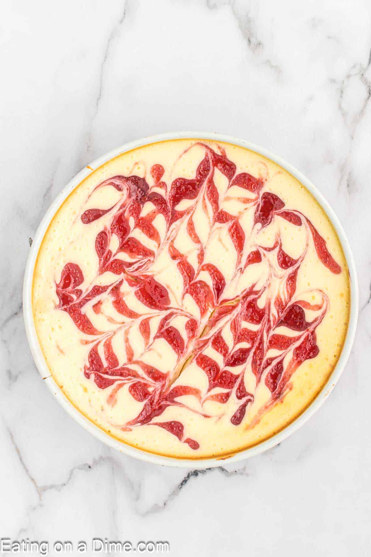 Baked strawberry swirl cheesecake