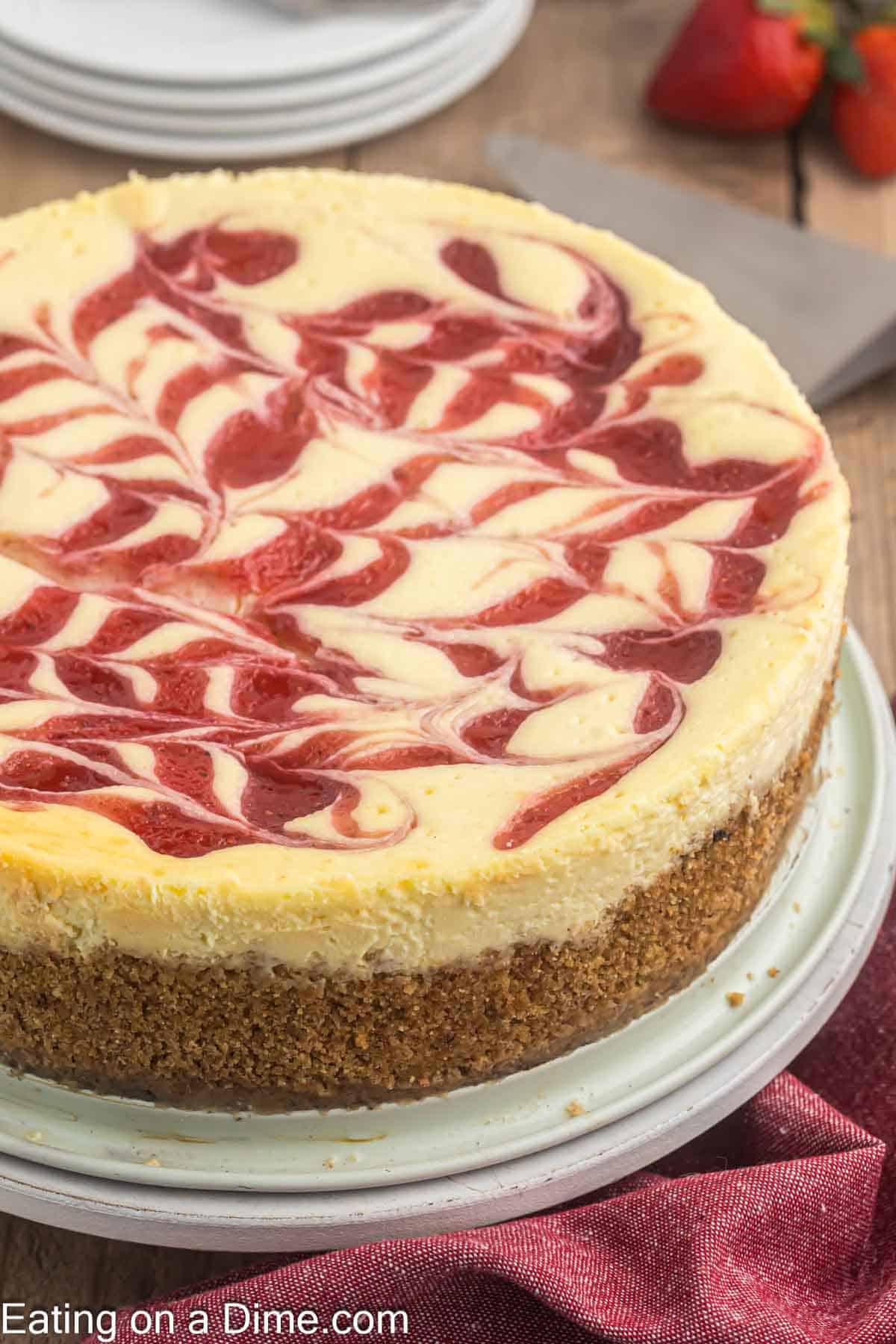 Strawberry Swirl Cheesecake on a platter