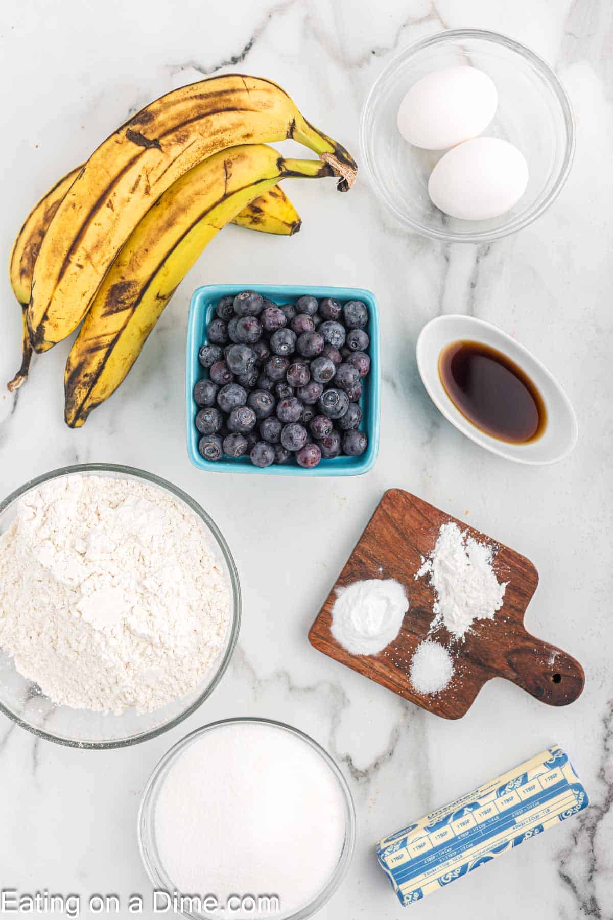 Ingredients - Flour, baking soda, baking powder, salt, sugar, butter, bananas, egg, vanilla extract, fresh blueberries