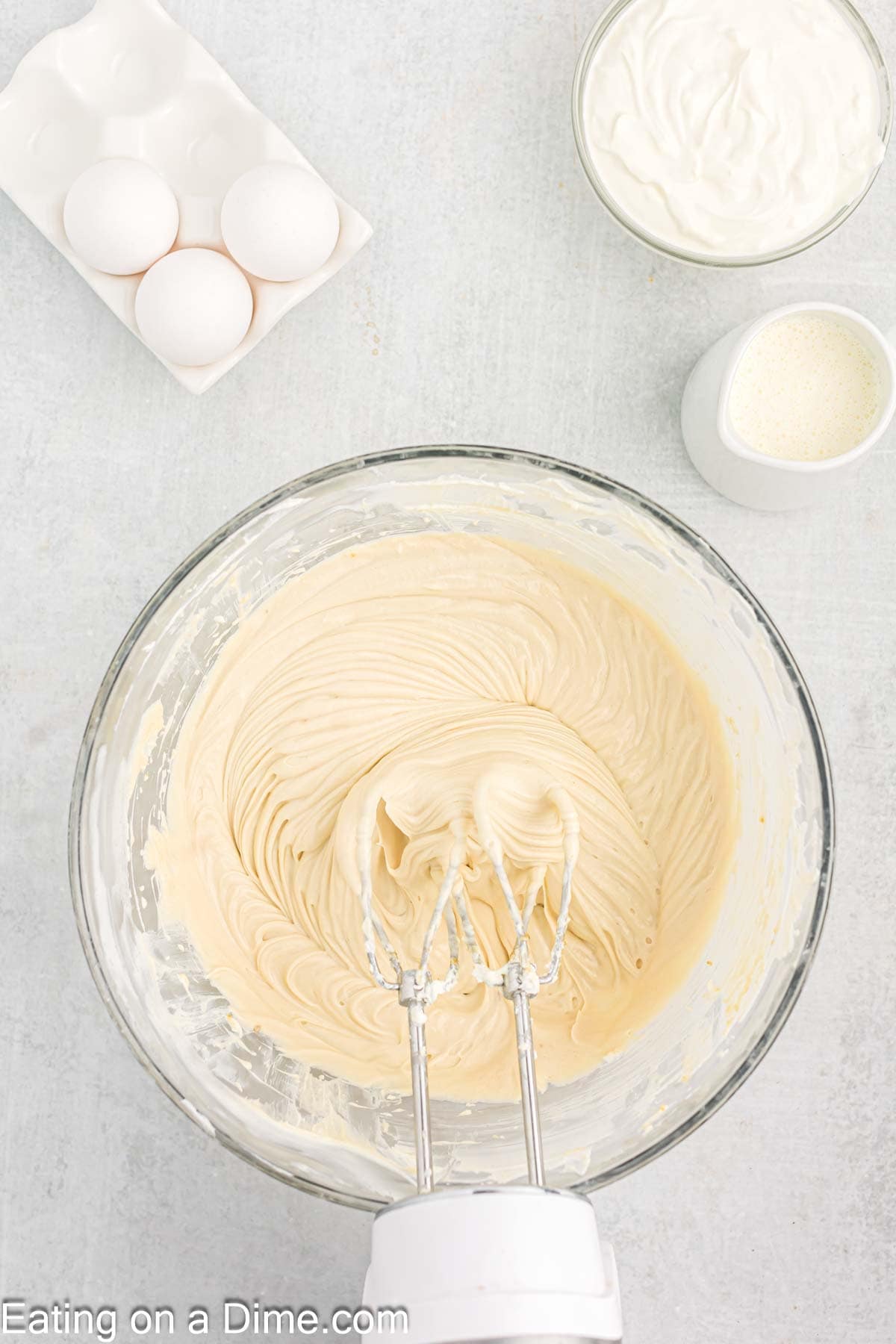 Mixing brown sugar and vanilla into the cream cheese mixture