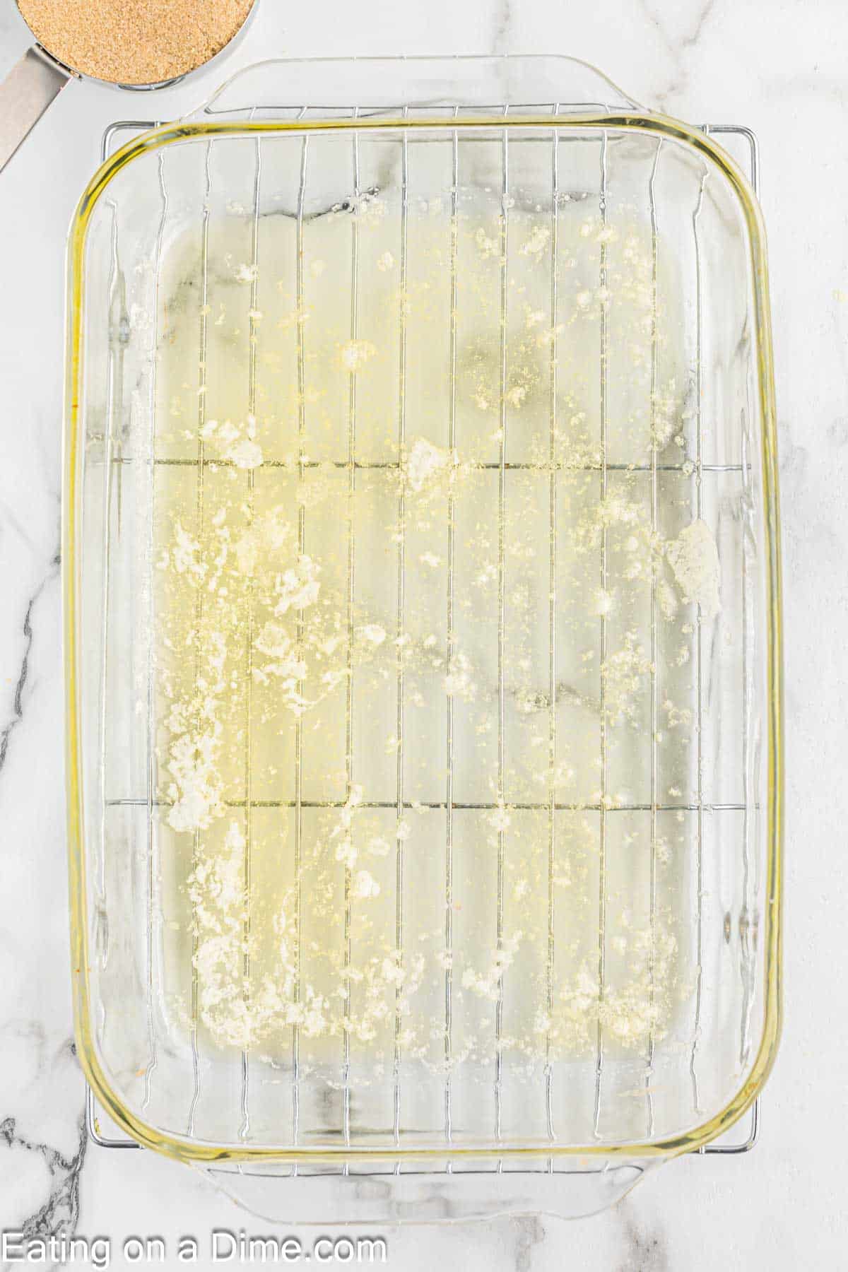 Melted butter in a glass baking dish