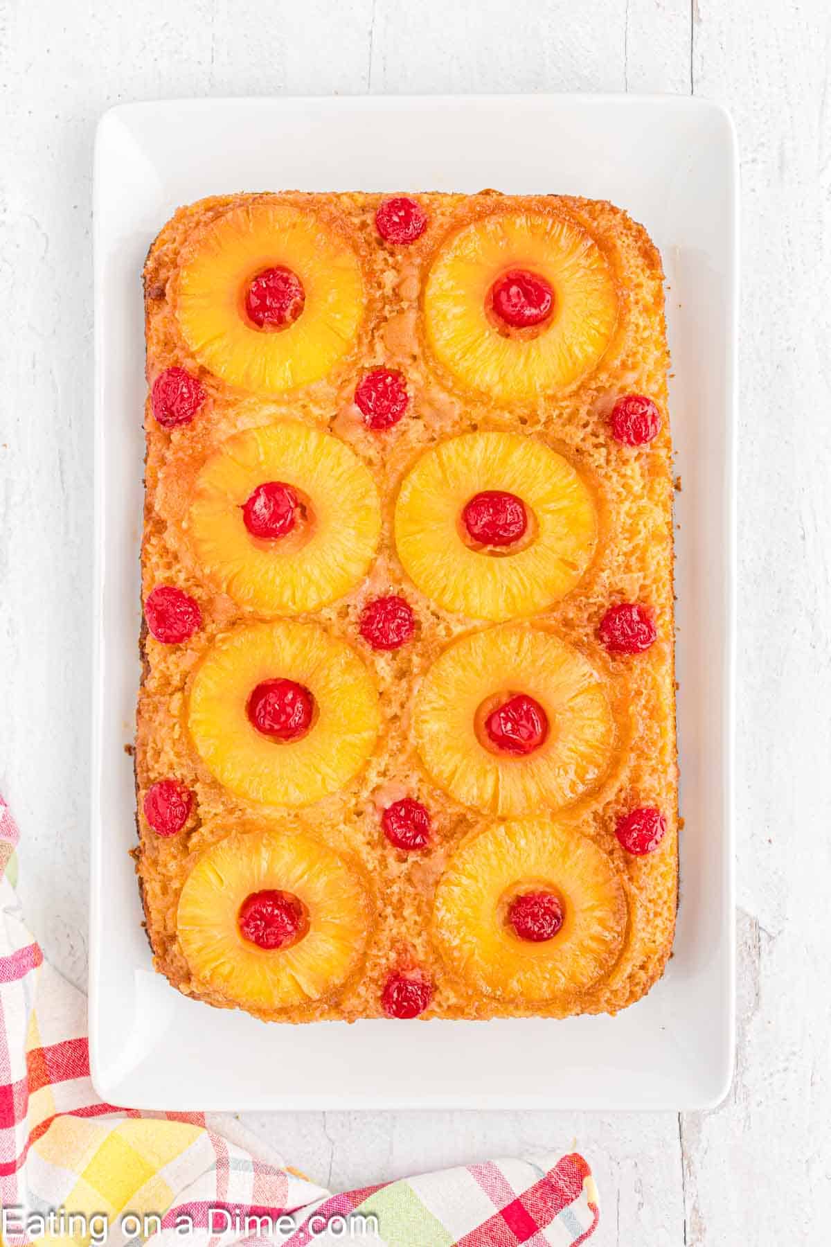 Baked Pineapple Upside Cake on a white platter