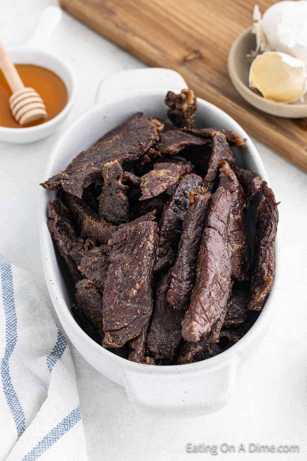 Beef Jerky strips in a white bowl