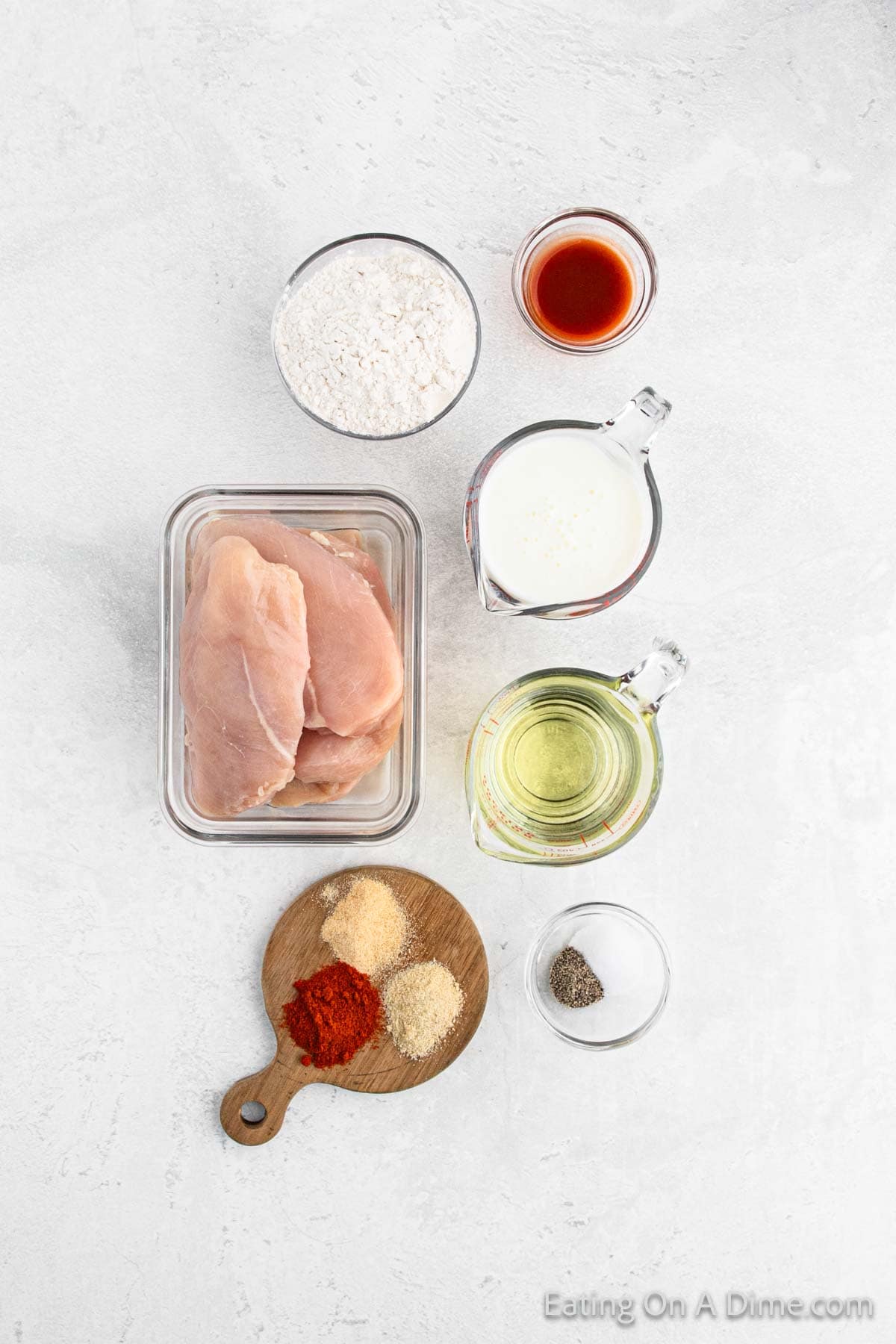 Ingredients - Chicken breast, flour, hot sauce, buttermilk, oil, paprika, garlic powder, onion powder, salt pepper