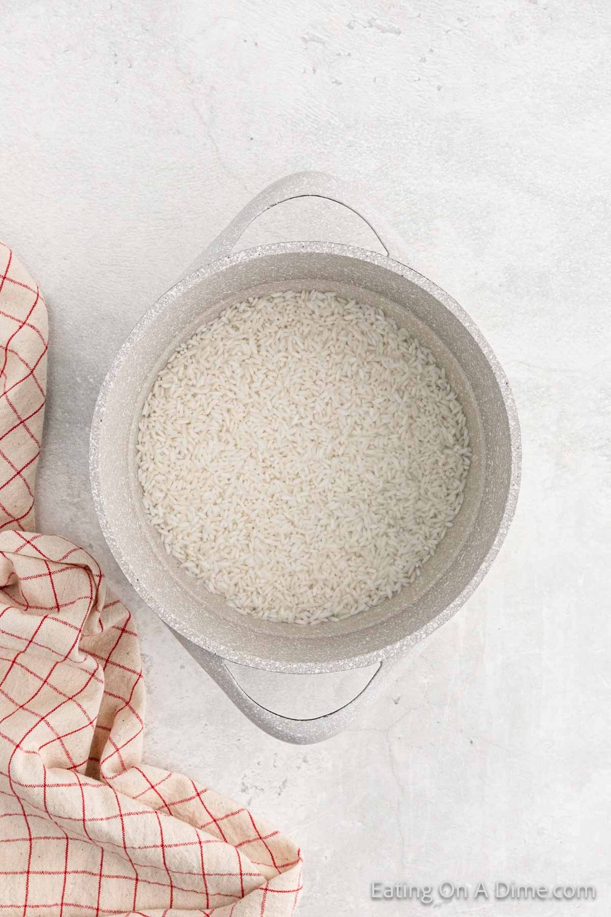 White rice in a large pot of water