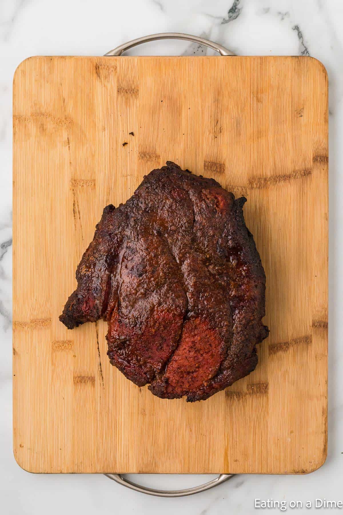 Smoked chuck roast on a cutting board