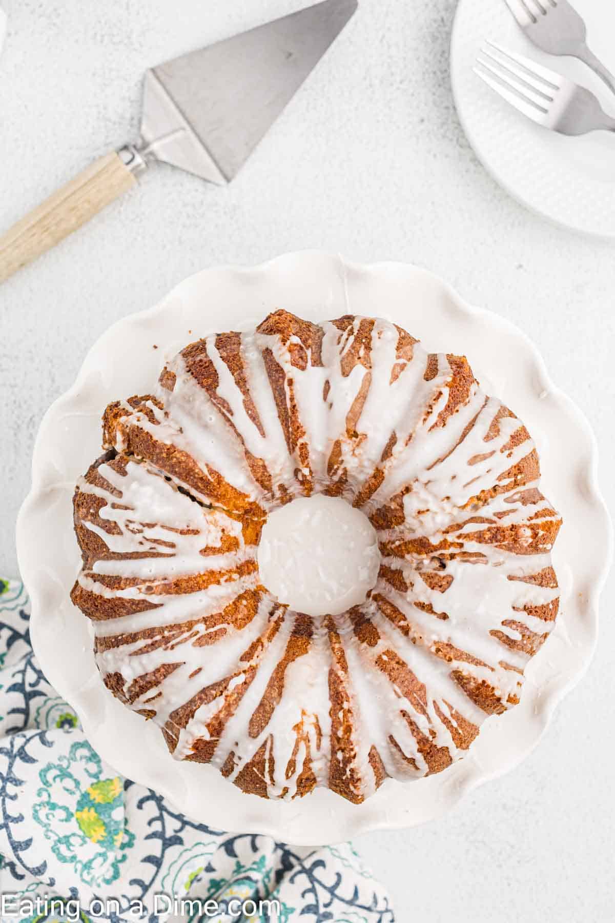 Glaze topped with bundt pan on the platter