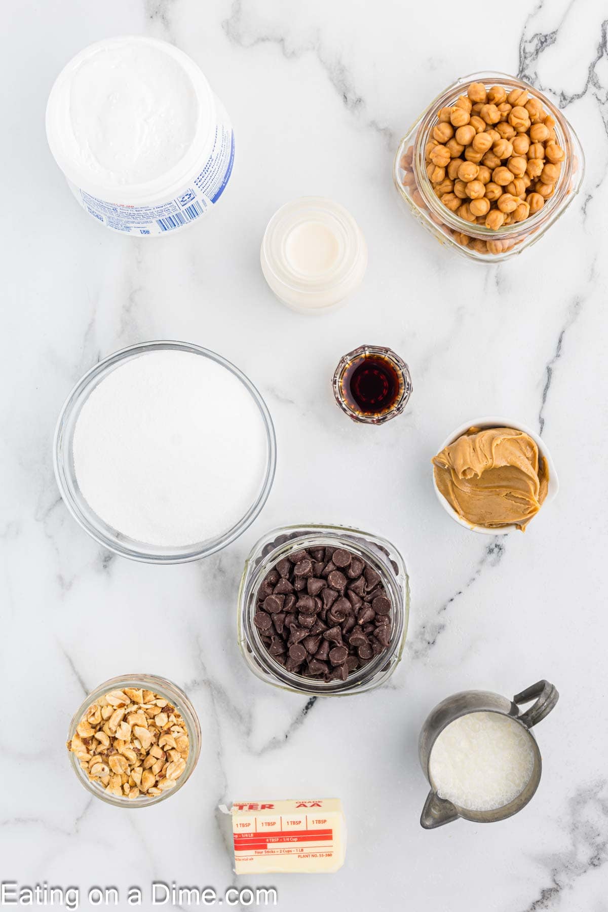 Ingredients - Chocolate Chips, peanut butter, butter, sugar, evaporated milk, marshmallow creme, peanut butter, vanilla extract, salted peanuts, caramels, heavy whipping cream