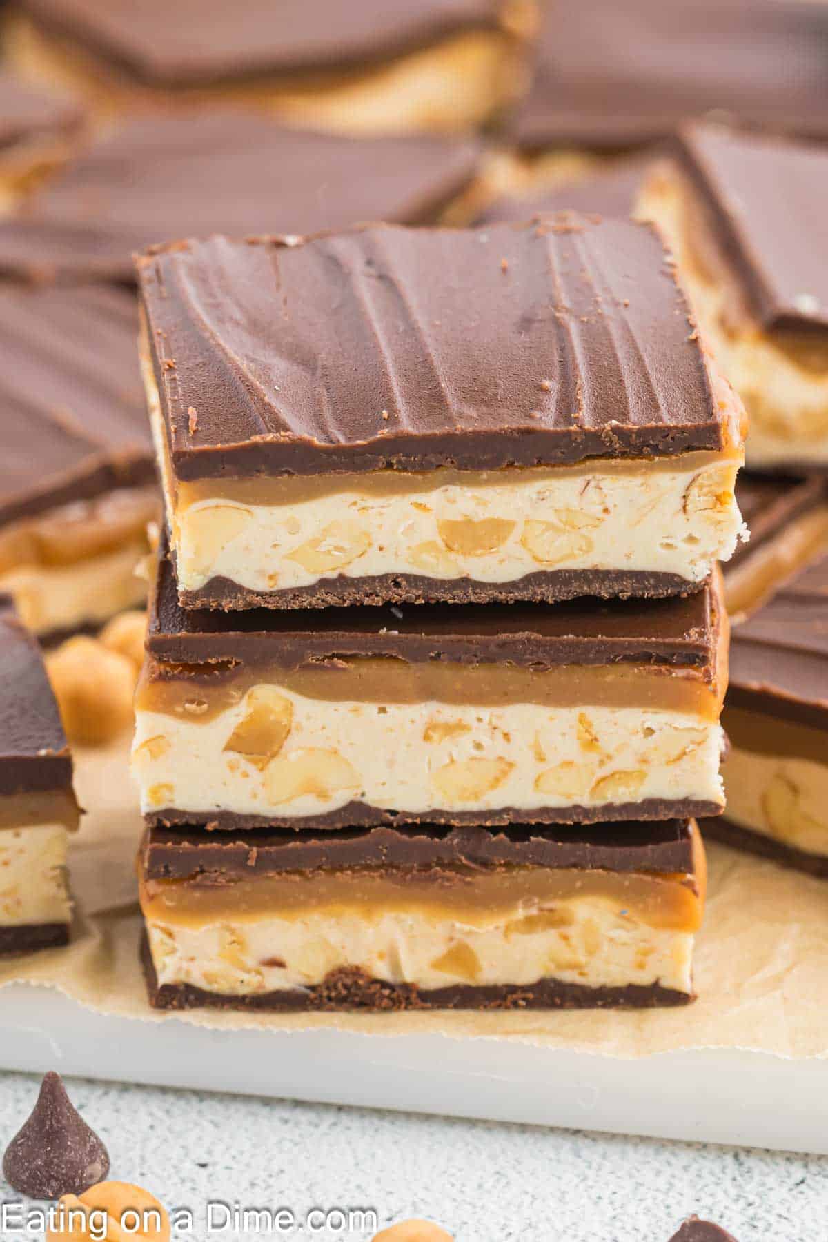 Homemade Snickers cut into squares  then stacked