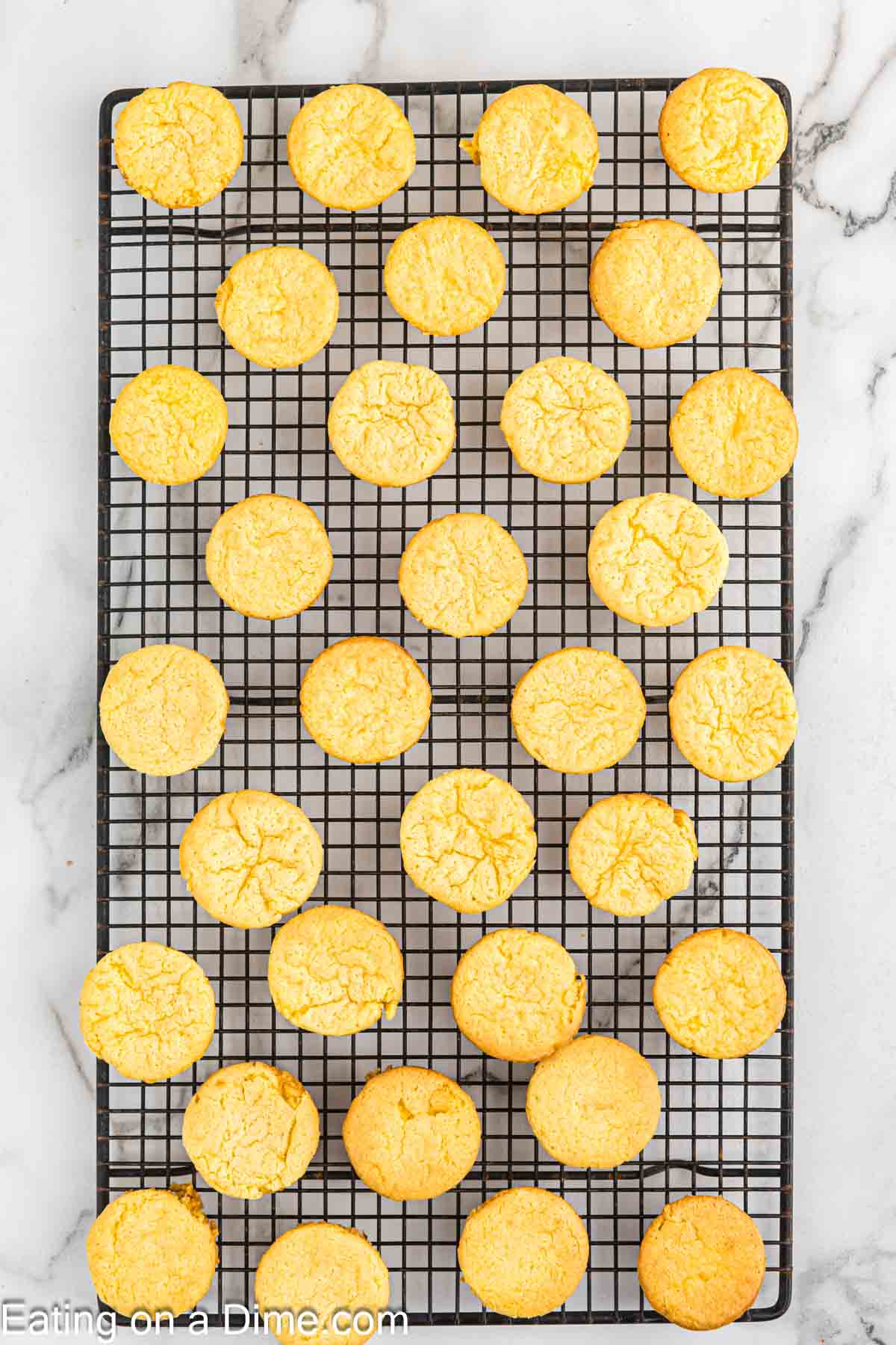 Baked lemon blossoms on a wire rack