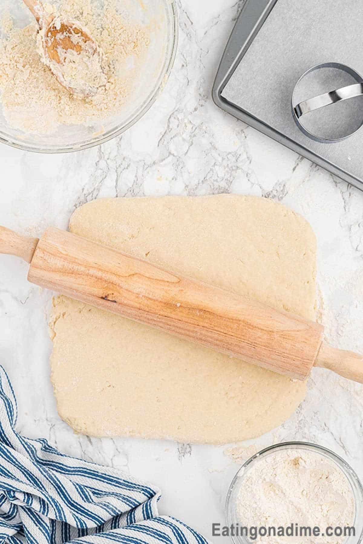 Rolling out the dough with a rolling pin