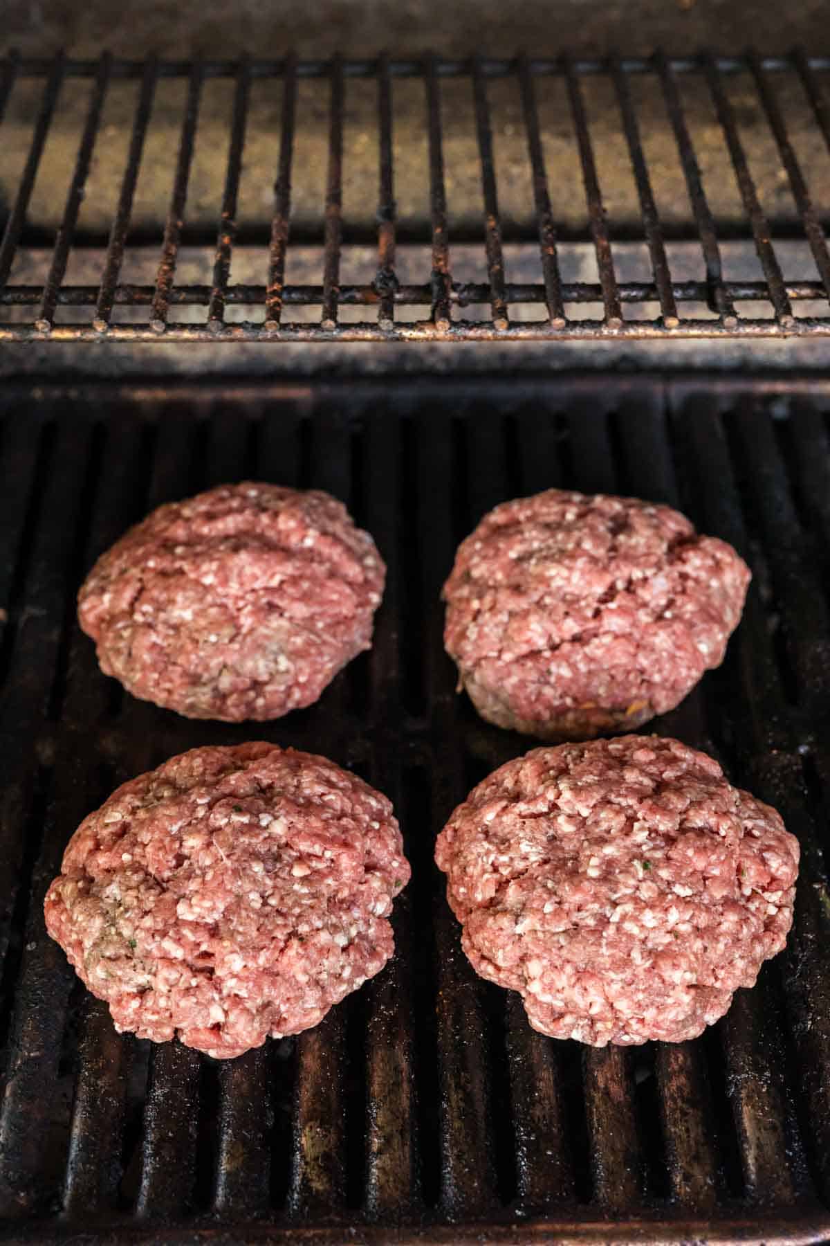 Place ground beef patties on the grill
