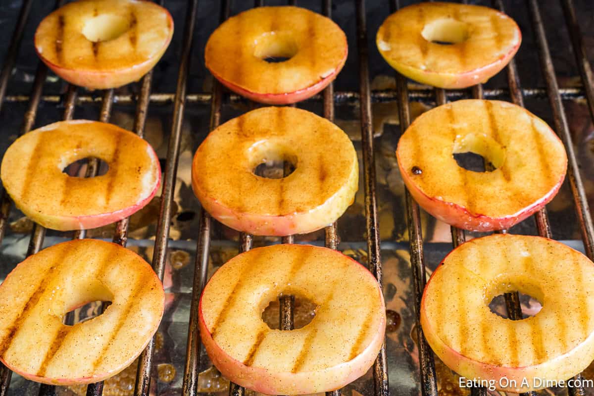 Slice apples on grill grates topped with brown sugar sauce