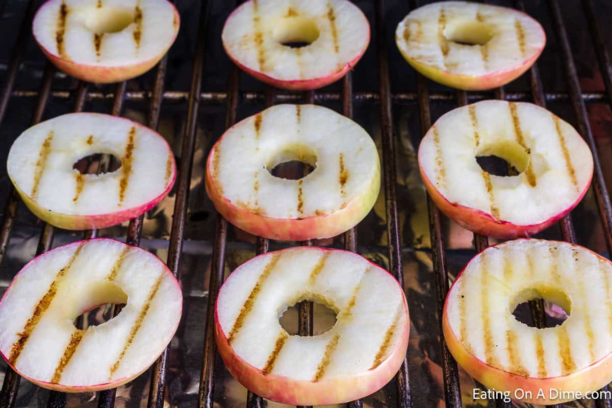 Slice apples with grill marks on grill grates