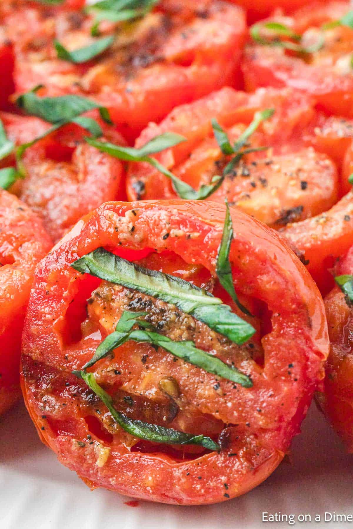 Grilled Tomatoes topped with fresh basil