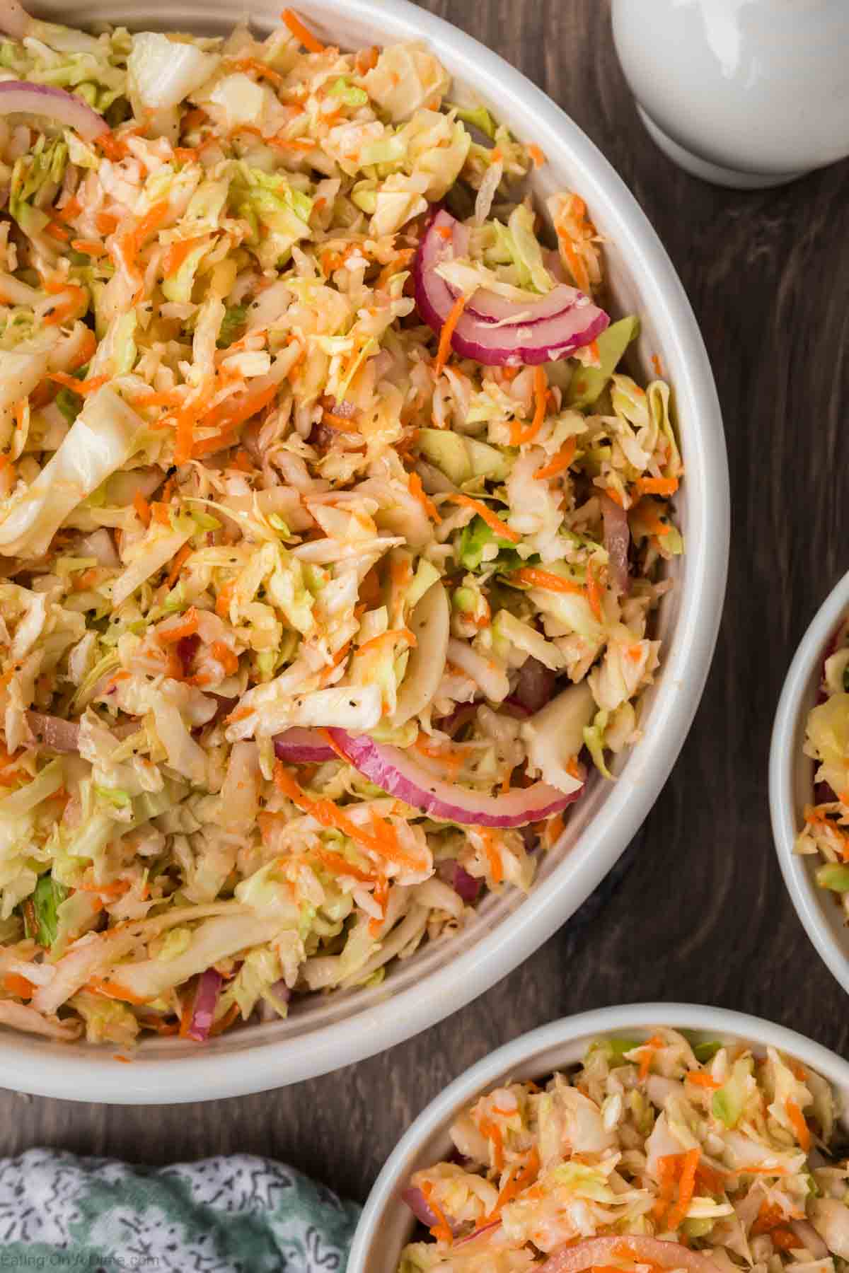 Vinegar Coleslaw in a white bowl ready to serve