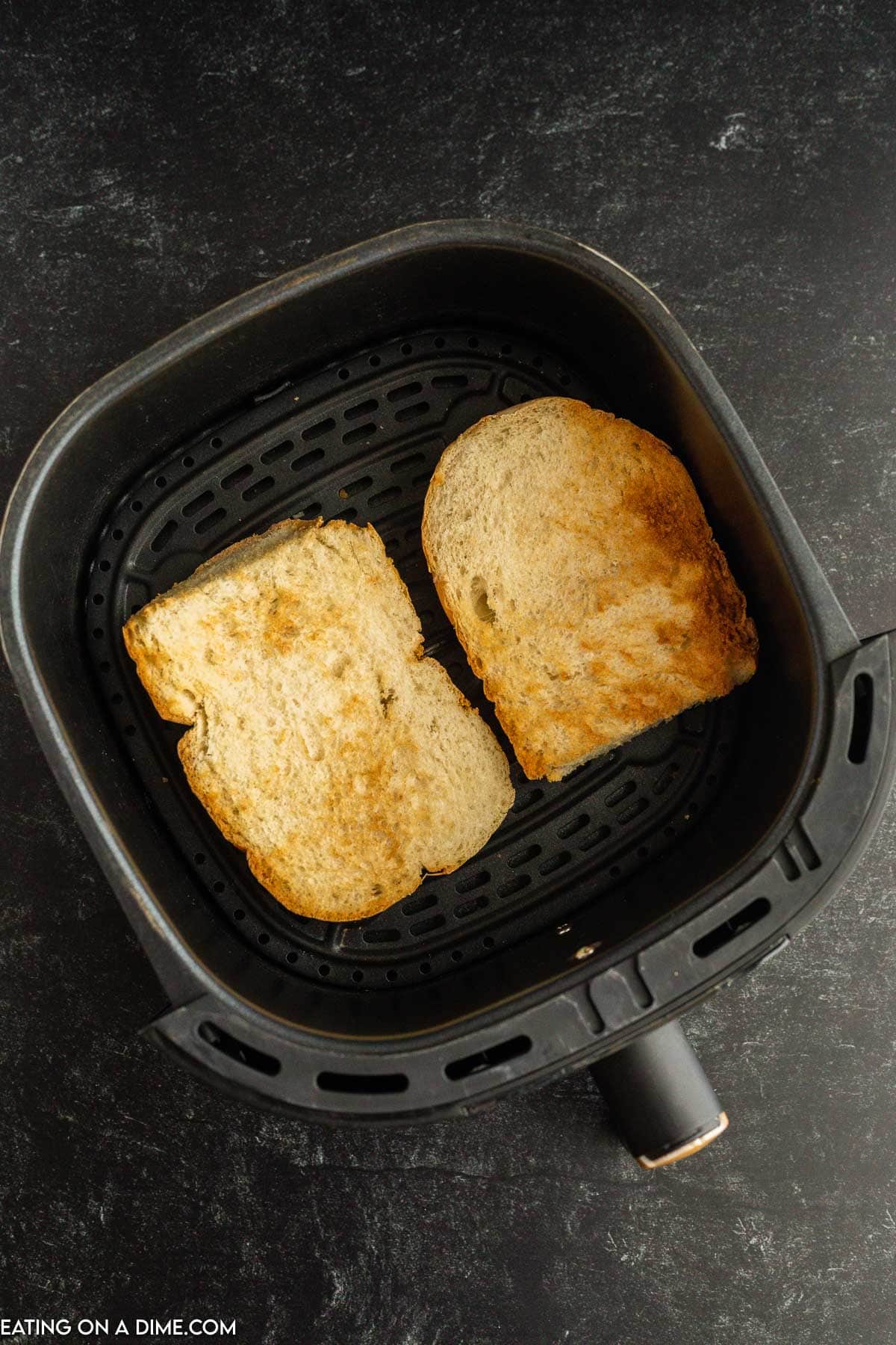 Toasted French Bread in a air fryer basket