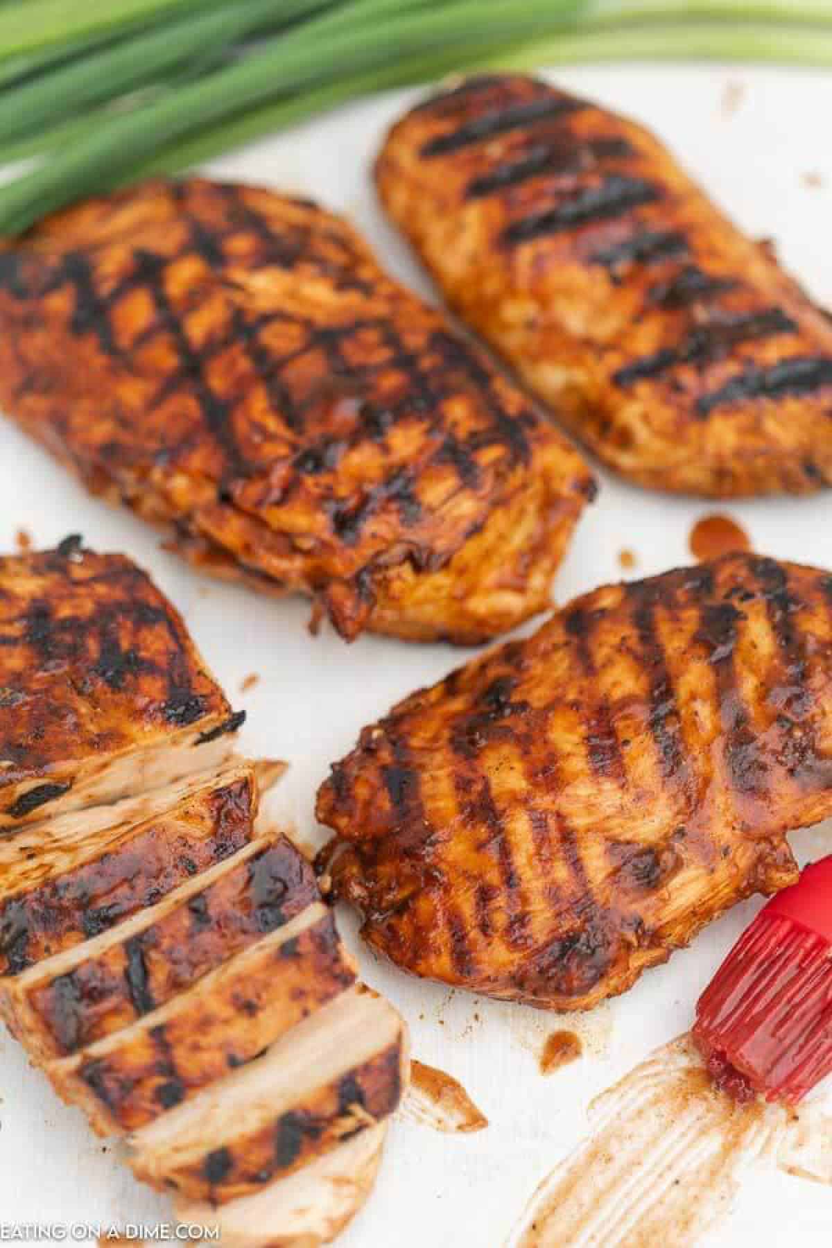 4 Grilled BBQ Chicken Breast on a plate