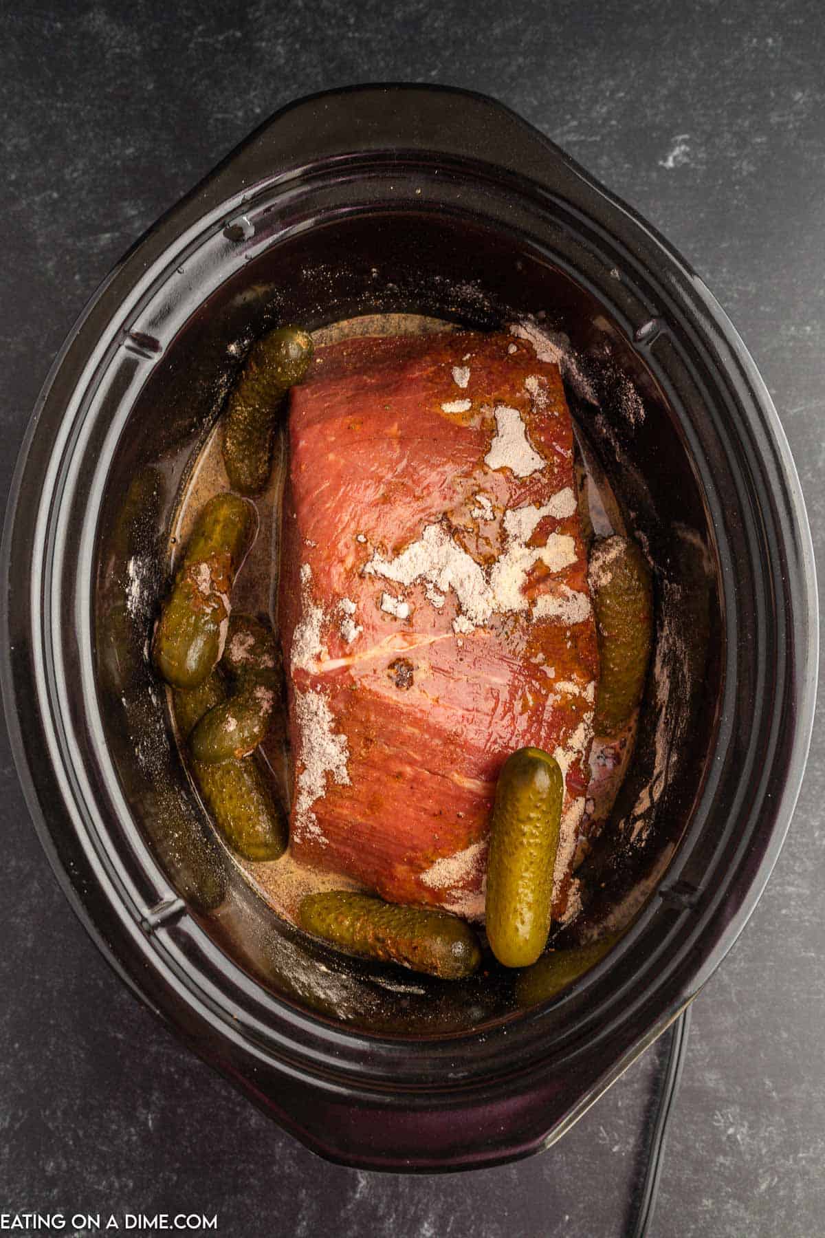 Roast in the slow cooker with pickles and sauce