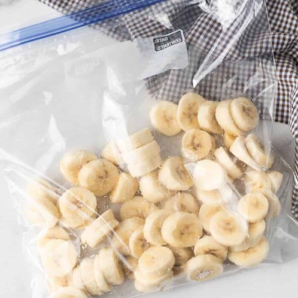 Slice bananas in a freezer zip lock bag