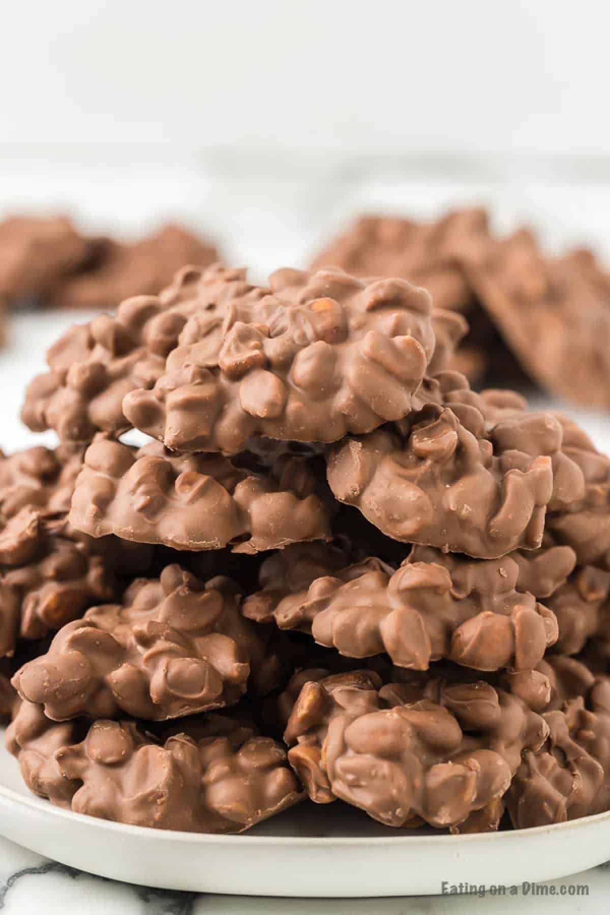 chocolate peanut clusters stacked. 