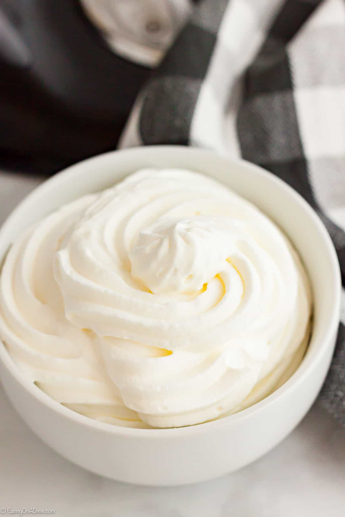 Homemade whipped cream in a bowl