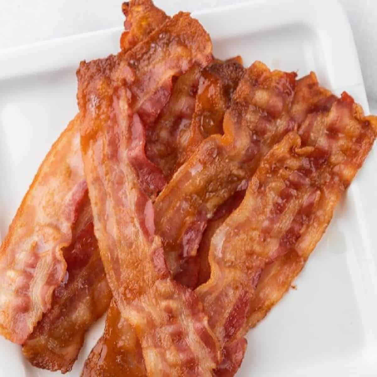 cooked bacon slices on plate