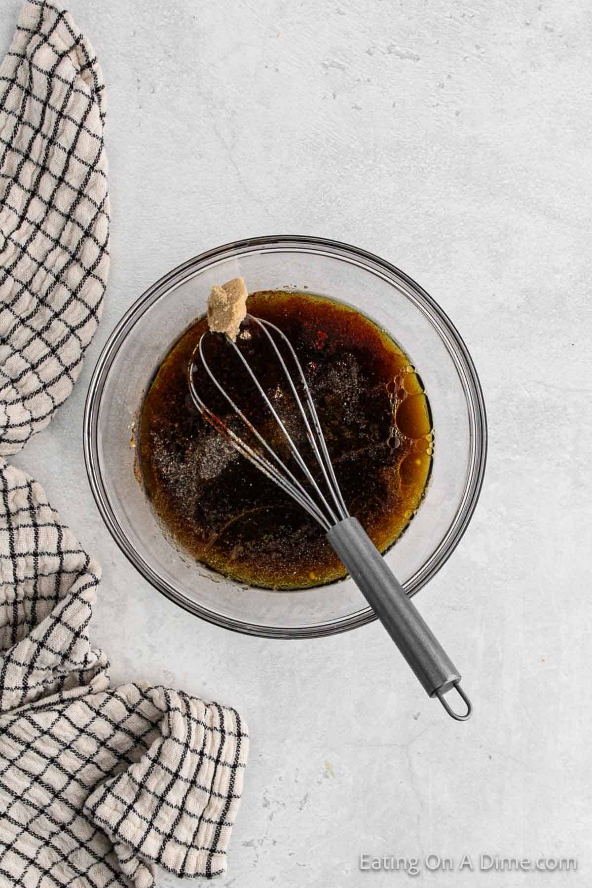 Combining the sauce ingredients in a bowl with a whisk