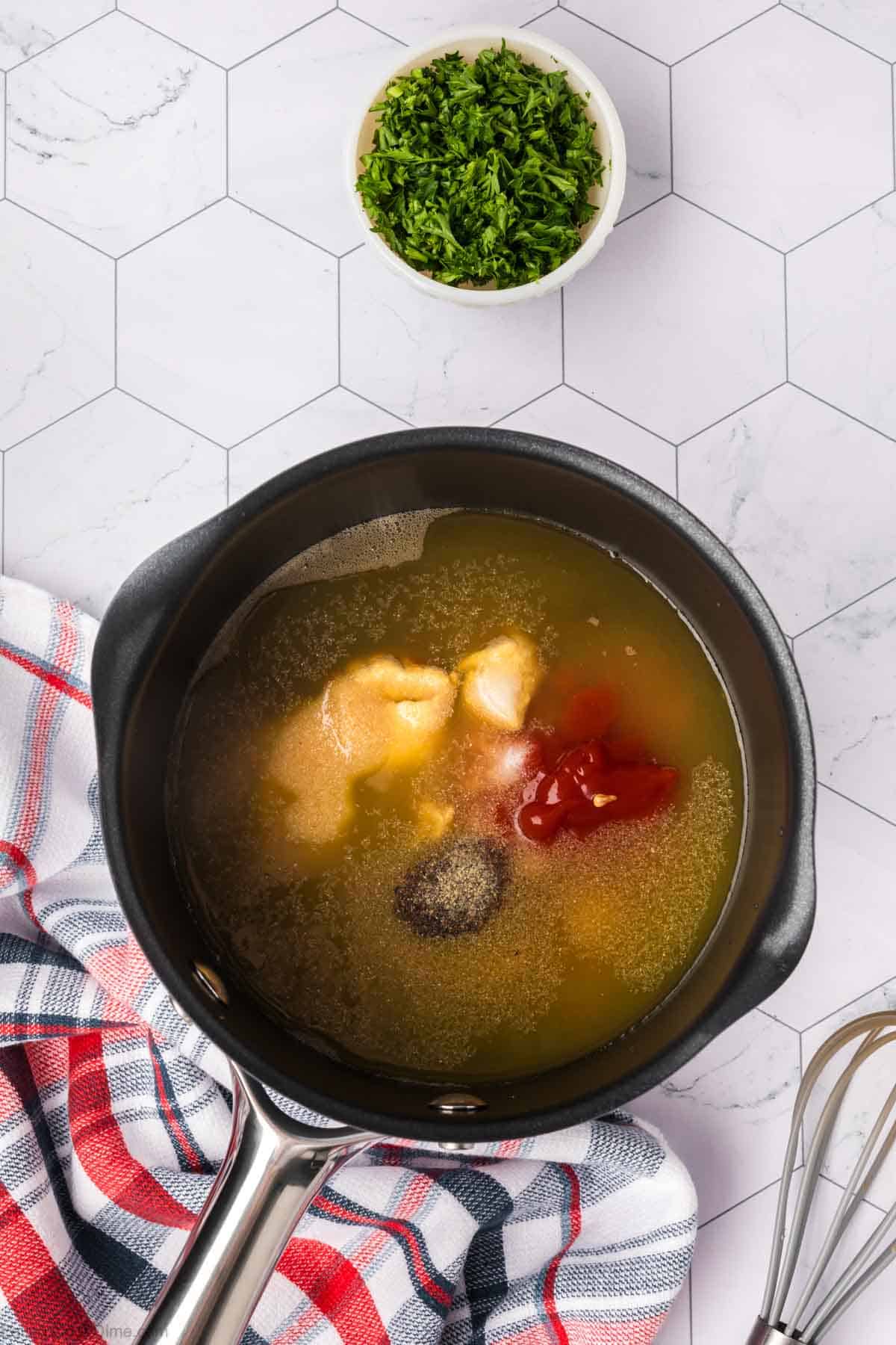 Adding the sauce ingredients to the saucepan