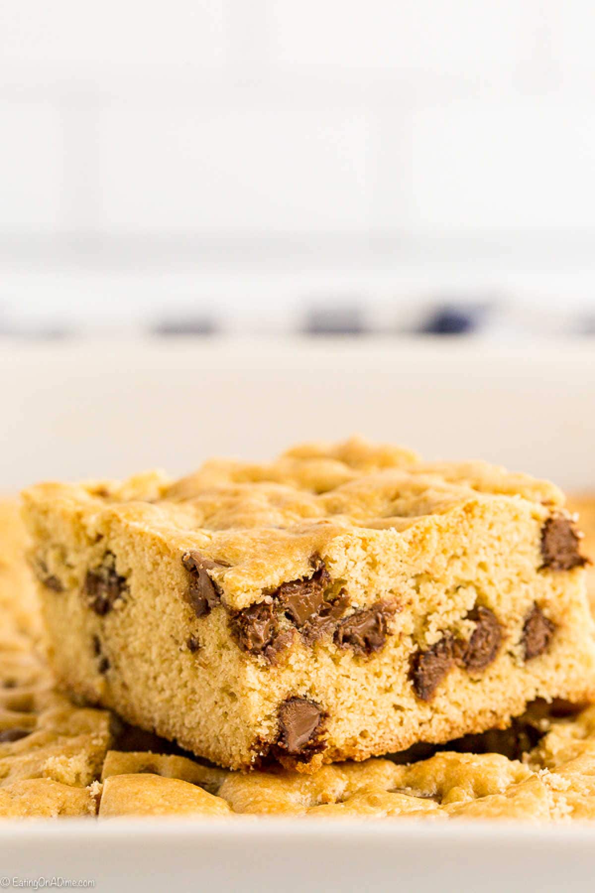 This chocolate chip cookie cake recipe is everything you love about a chocolate chip cookie but in a cake! Basically, it is heaven in every bite!