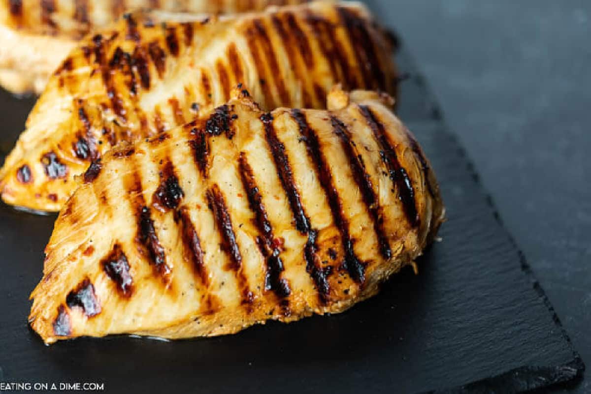 You are going to love this 2 ingredient chicken marinade that is perfect for grilled or baked chicken. This Italian Soy Sauce Marinade is easy to make and packed with flavor. This is definitely of the best chicken marinades! #eatingonadime #marinaderecipes #grillingrecipes 