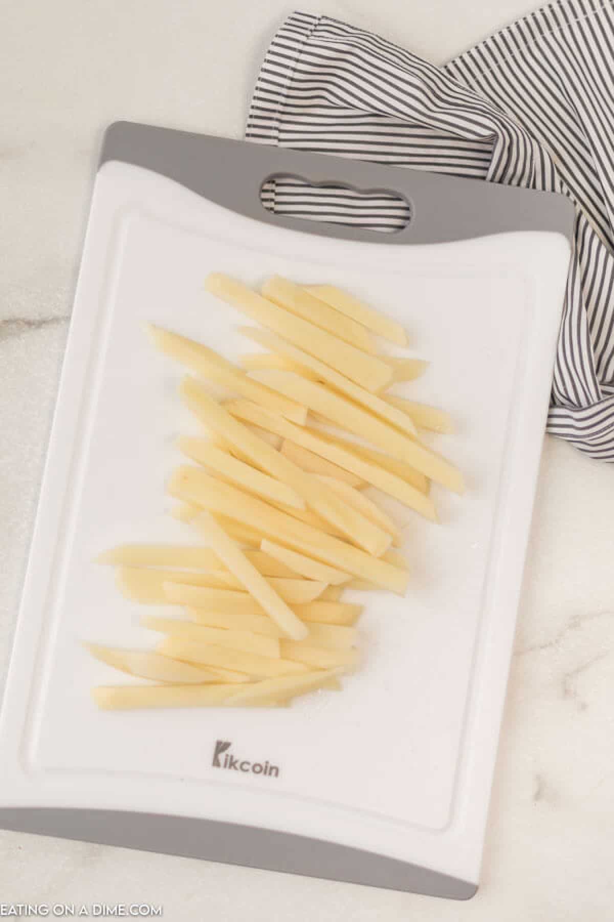 cutting board with French fries