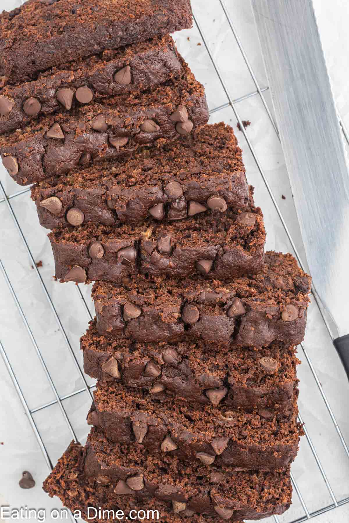 Slice Chocolate Banana Bread on a wire rack