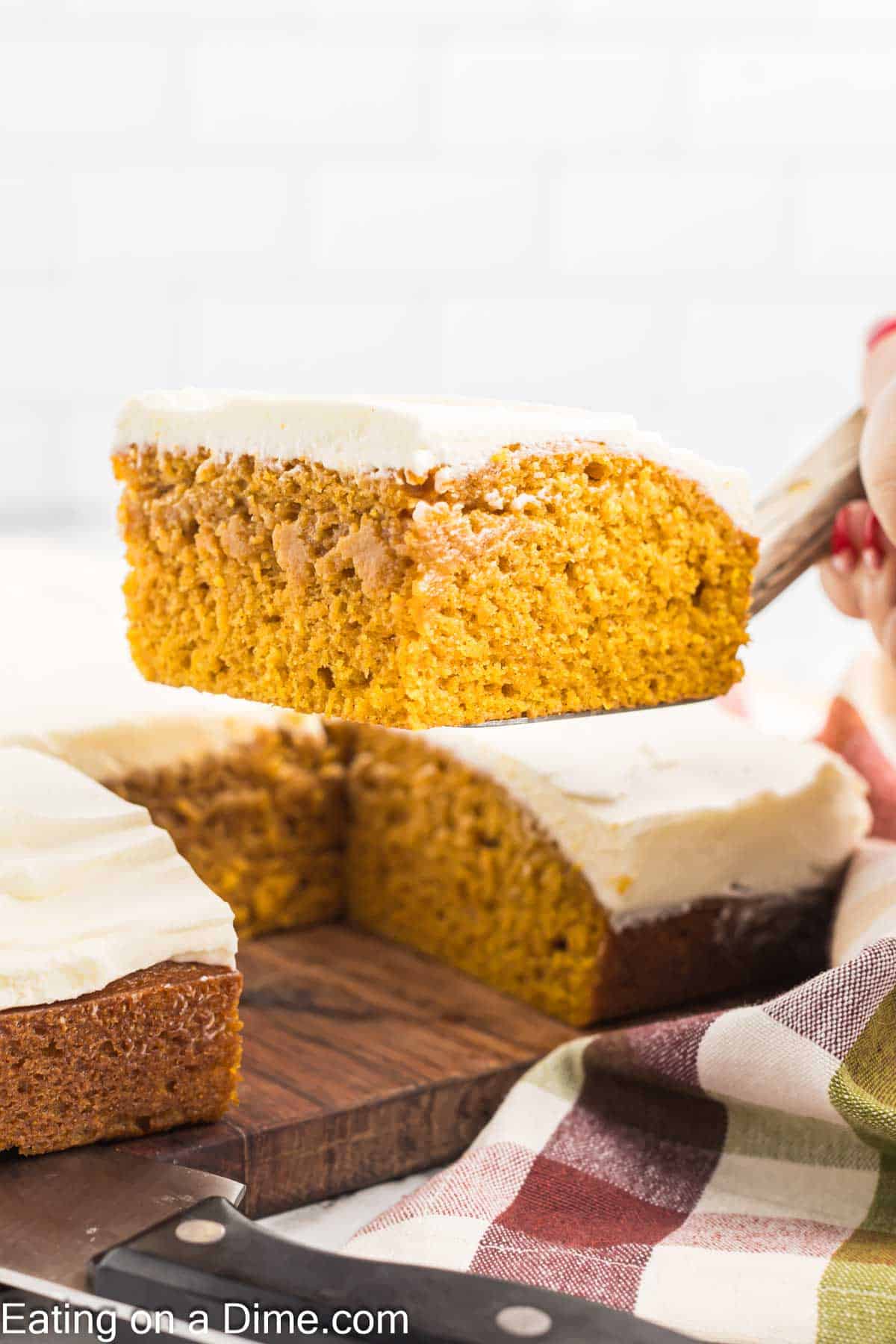 Pumpkin bars with a serving on a spatula