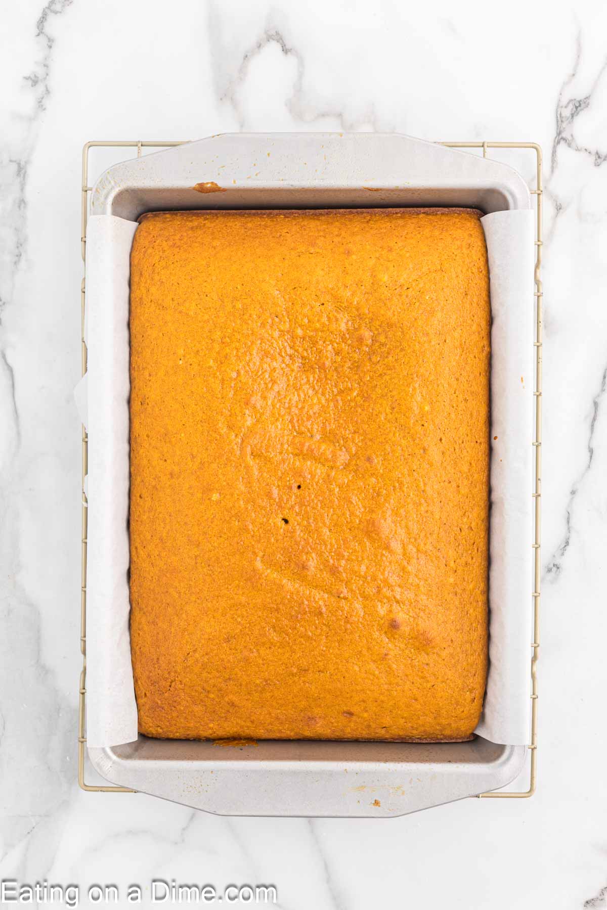 Baked pumpkin bars in a baking dish