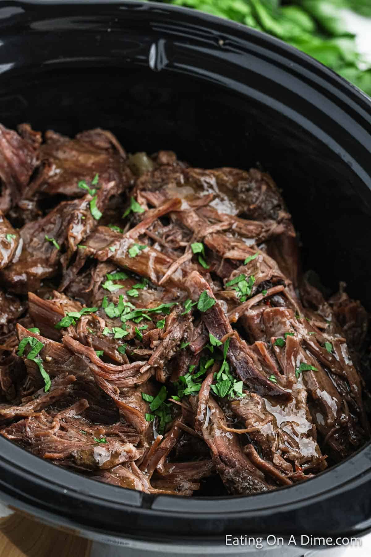 Shredded roast in the slow cooker