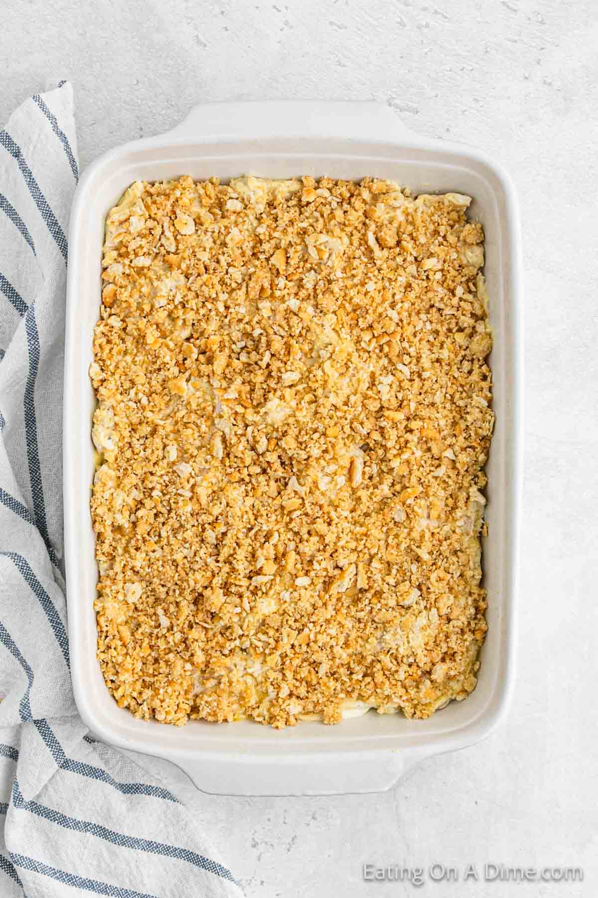 Ritz Crackers topping on the chicken mixture on a baking dish