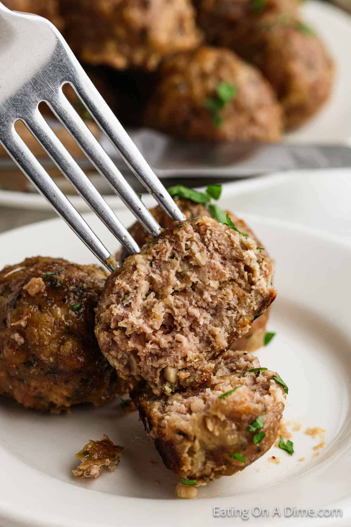 Turkey meatballs on a plate with a fork