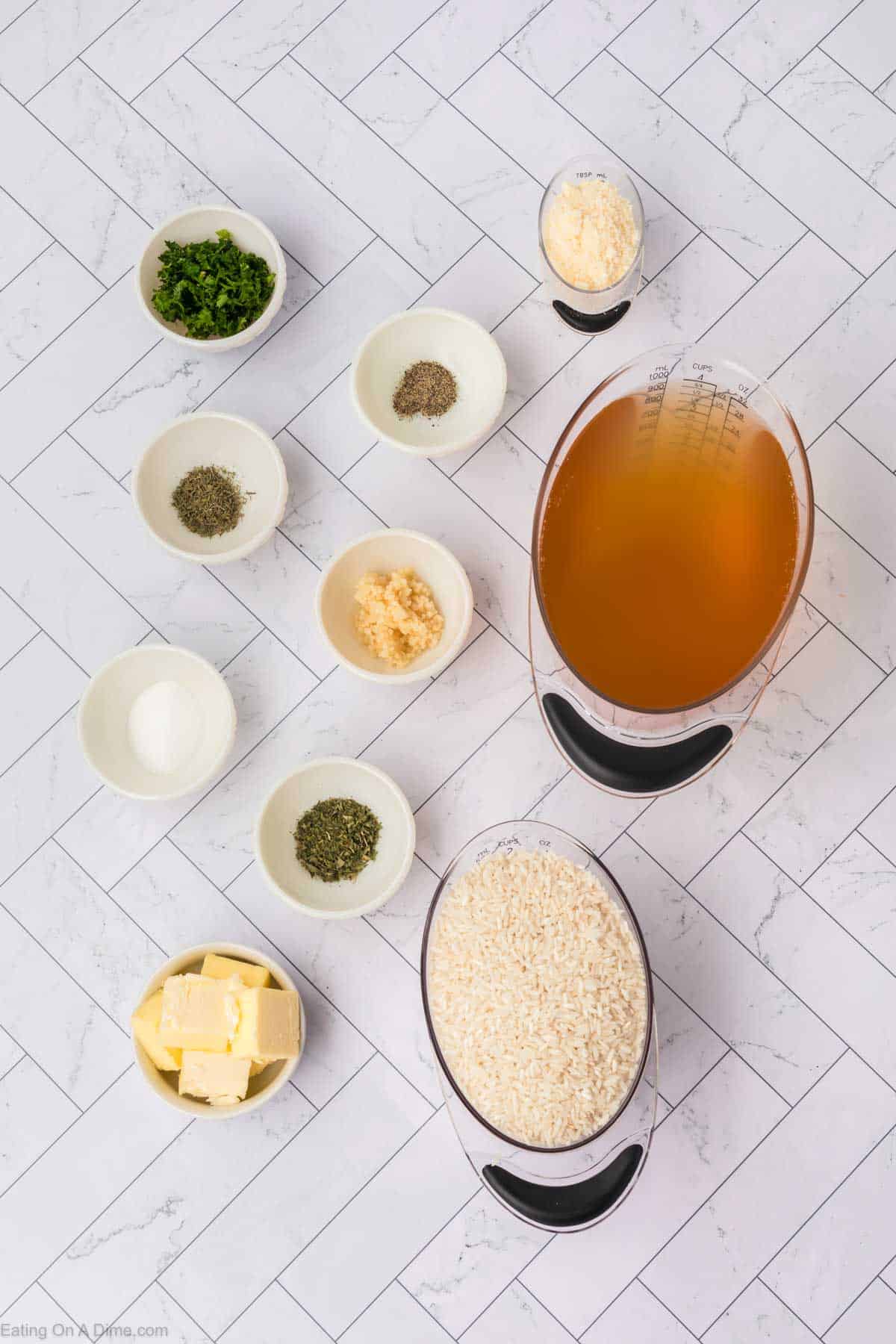 Ingredients - Long Grain Rice, chicken broth, butter, garlic, parsley, salt, thyme leaves, pepper, parmesan cheese