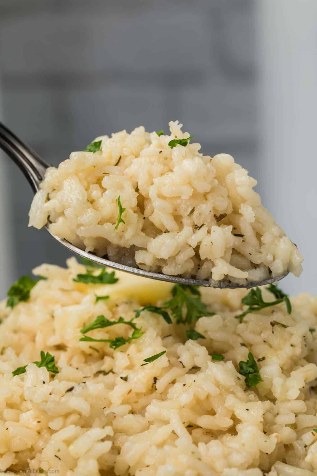 White rice with a bite on a spoon