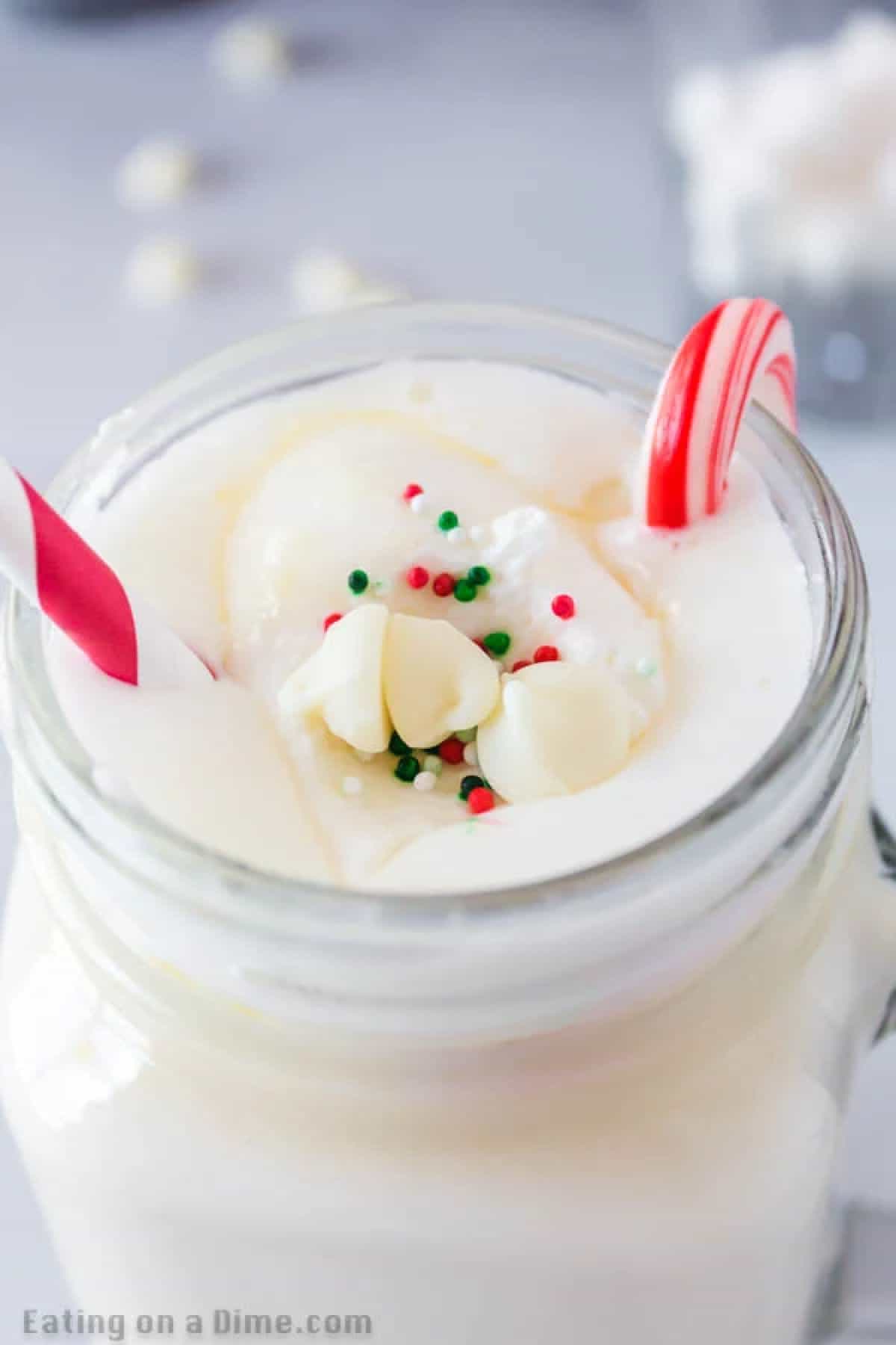 Crock pot white hot chocolate recipe is perfect to serve for a crowd at parties, holidays and more. Keep your hot chocolate warm all night long!